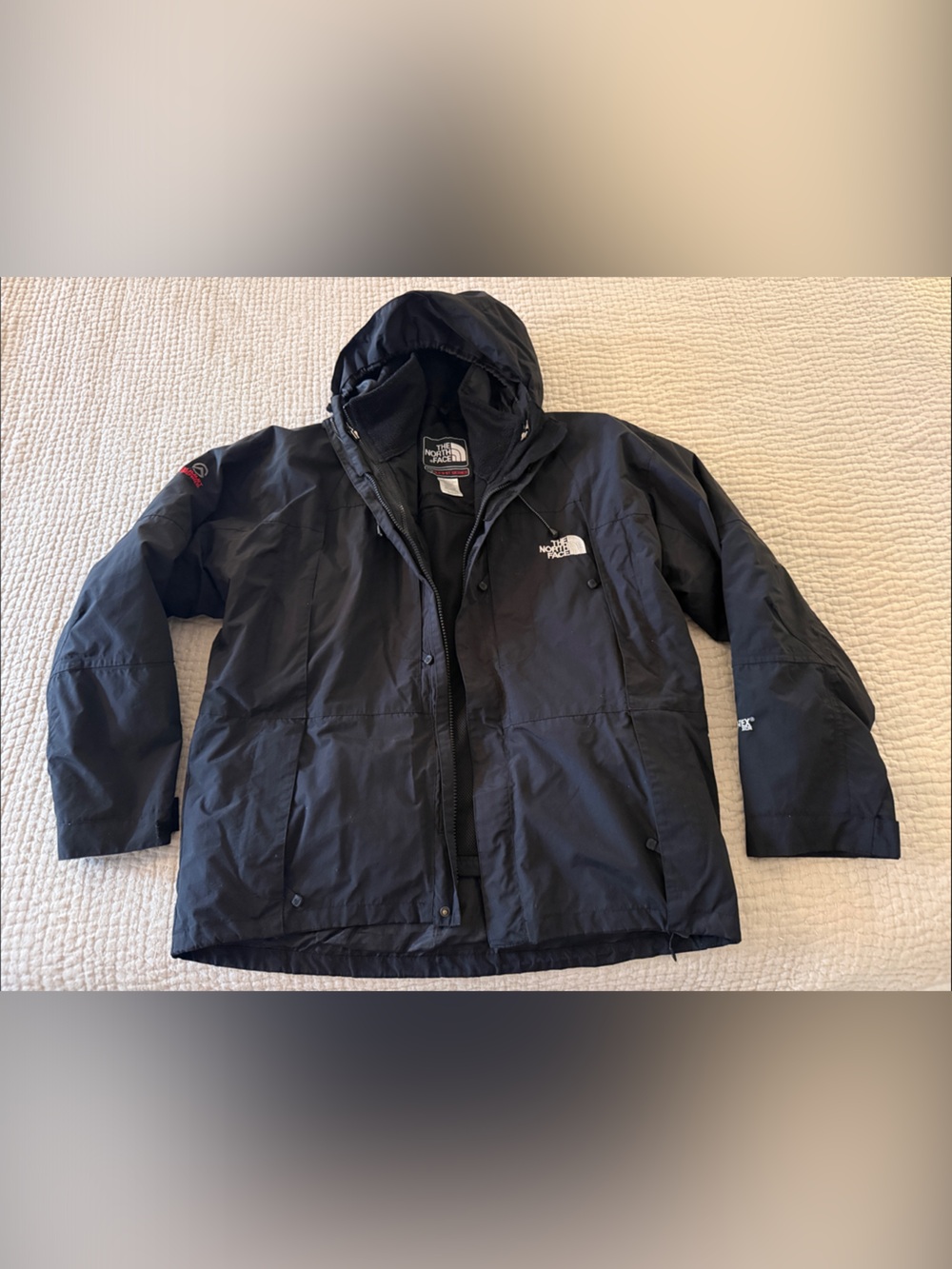 The North Face Men's Black Hooded winter Ski Coat with removable fleece liner